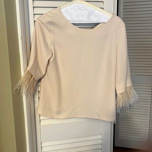 Beautiful blouse with feather detail
